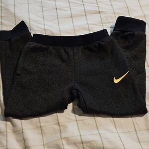 Nike Kids Glittery Black Joggers with Gold Swoosh